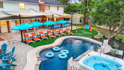 Medical Center District House | Resort Style Backyard Pool Putt Putt Hot Tub