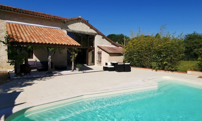 Champniers House | Restored barn from late 18th century with pool