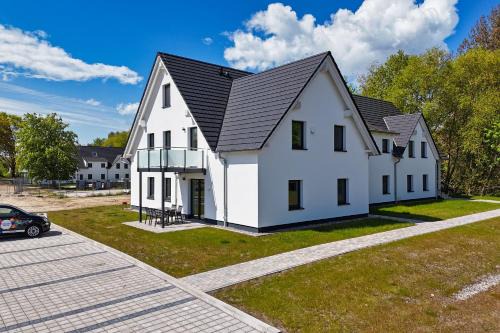 Lobbe Apartment | Rex Rugia FeWo15-6 mit Schwimmbad und Saunanutzung im AHOI-Erlebnisbad Sellin