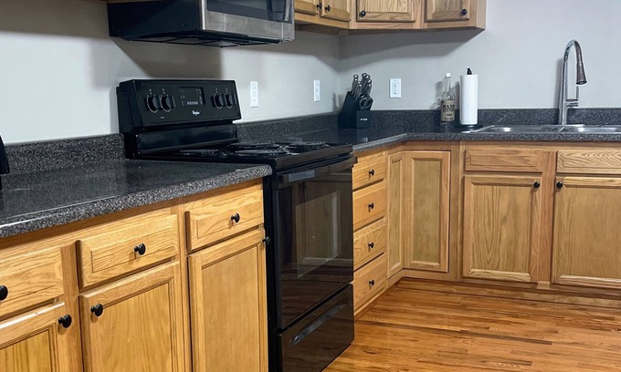 Covel House | Ride to the trails! Comfortable 5 bedroom house, large parking area!