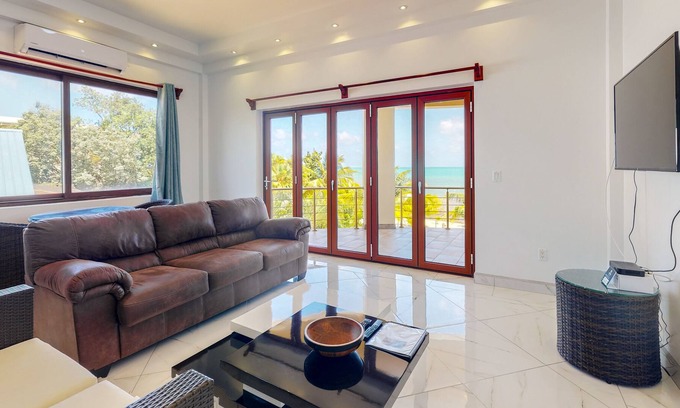 Surfside Condo | Romantic beachfront apartment w/ ocean views, shared pool, partial AC & WiFi!