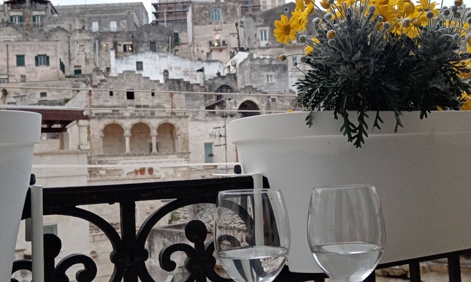 Matera Apartment | Roots - The window in the Sassi