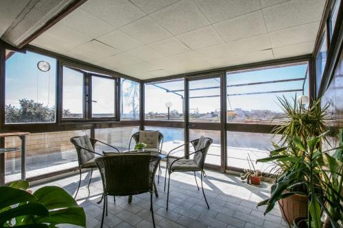 Isola Sacra Apartment | Royal Penthouse - Three-Bedroom Suite - Fiumicino Airport