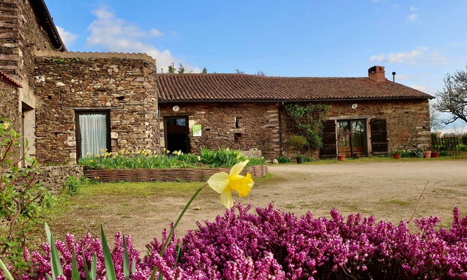 La Tardiere Cottage | Rustic 18th Century Stone Cottage with Eco-Friendly Restorations, Terrace, and Playground