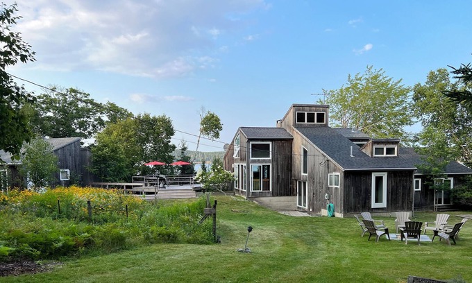 Deer Isle House | Rustic home with guest houses along a private beach in Little Deer Isle, Maine.