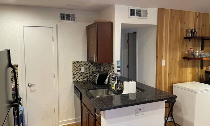 South Lamar Condo | Rustic Pool Front Condo with AC, High Speed Wifi in Beautiful Austin, TX