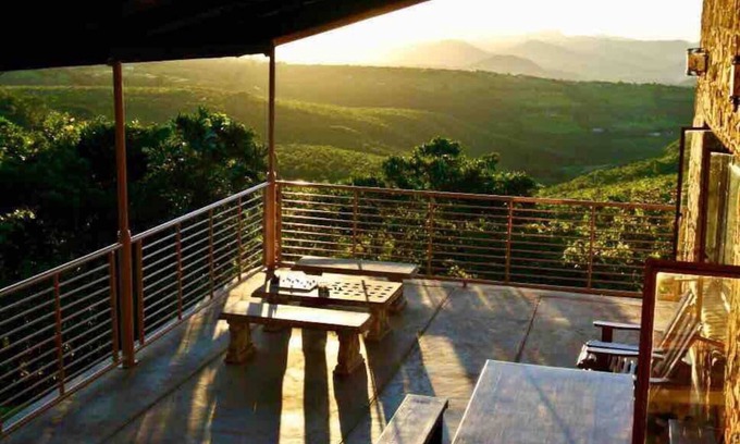 Nyanga Cabin | Rustic stone walls with modern conveniences in an African setting.