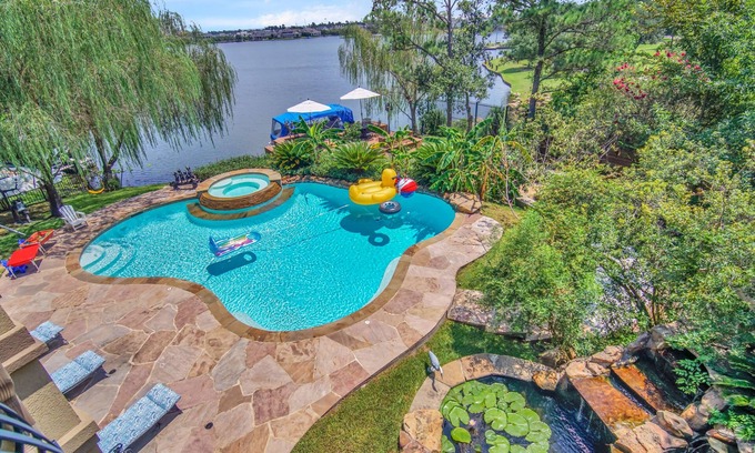 Panther Creek House | Sail to Hughes Landing, Waterway, or Pavilion. Heated Pool, Jacuzzi, & Cinema