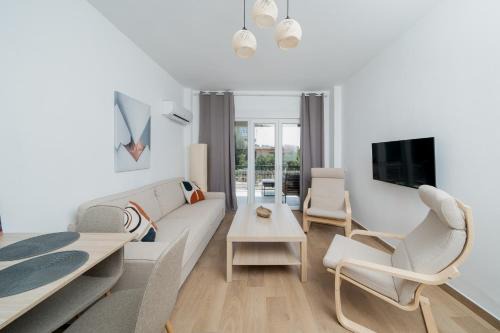 Porto Rafti Apartment | Sandlight Apartment by A&D Properties