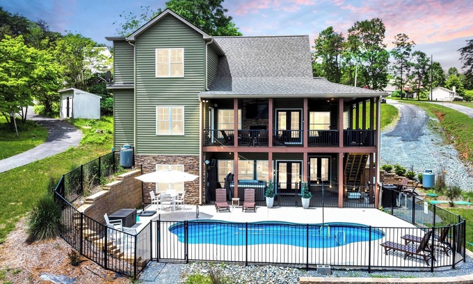 Moneta House | Sandy Bottom Cove, New Lakefront Luxury w/Covered Decks + Heated Salt Pool, Beach, Hot Tub, Dock!