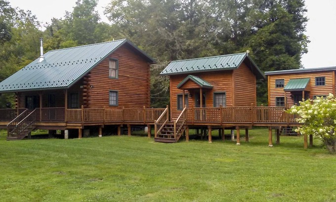 Titusville Cabin | Scenic Log Cabin with Fire Pit & Stocked Creek!