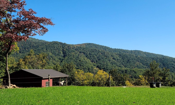 Hood House | Scenic mountain getaway with a firepit and amazing views of mountains and horses