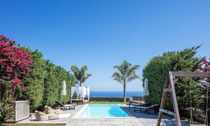 Tria Monastiria Villa | Sea & city views, short drive to beach & shops, heated pool and ping pong!