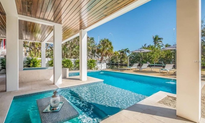 Anna Maria House | Sea La Vie Beach House - Luxury Home w/Pool, Spa, Dock & Canal Access on Anna Maria