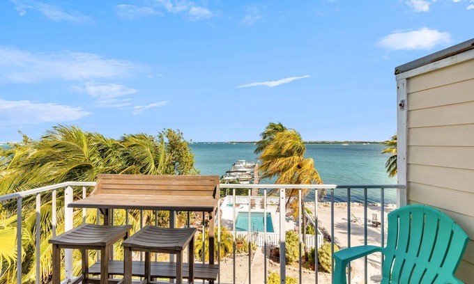 New Town Condo | SEA-NIC VIEW ~ 2 BR/2Ba Water-front views, Heated Pool Access and Dockage!