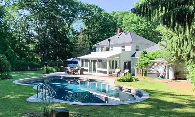 Hampton Falls House | Seacoast home with private pool, sunroom, patio, grill, firepit, & fireplace