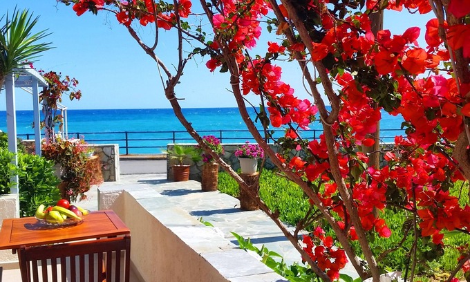 Milatos Beach Apartment | "Seaside Studios", BY THE SEA, in a colorful garden! Ideal for couples