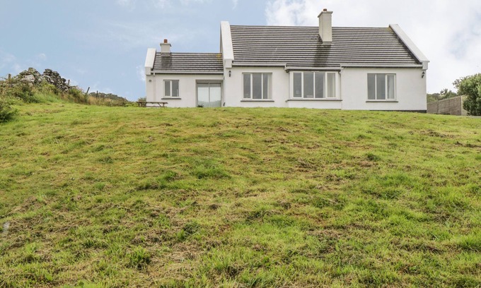 Renvyle Cottage | SEASPRAY, pet friendly, with open fire in Tully, County Galway