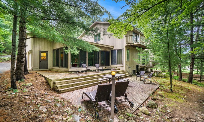 Maple City Cottage | Secluded home with three kitchens, vaulted ceilings, washer/dryer, & patios