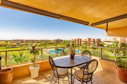 Menara Apartment | Serene Oasis Pool & Garden View