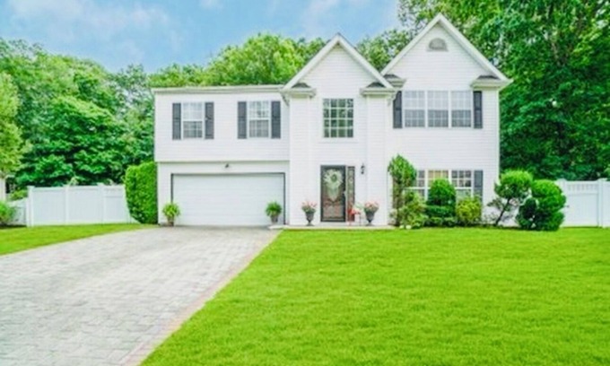 Coram Apartment | Serenity Haven: Cozy 2-Bedroom Home with Spacious Living & Big Backyard