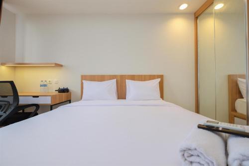 Pondokcina Apartment | Simply Design Studio Room Evenciio Margonda Apartment By Travelio