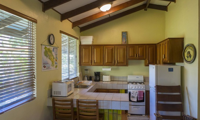 Savegre House | Slice Of Paradise, Bungalow for 2, full kitchen & bath, king bed, AC, & gazebo