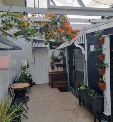 Caloundra Apartment | Small PET FRIENDLY Granny flat with paved courtyard