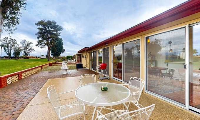 Sunland Village House | Snowbird-friendly golf-front home with pool, hot tub, grill, smart TVs, W/D, AC