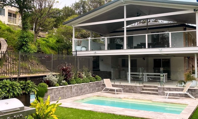 Culburra Beach House | Sounds by the Sea – Inground swimming pool, fire pit, games area