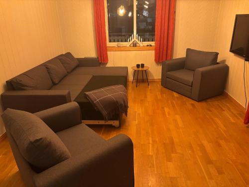 Harstad House | Sovesofa i stue, soveplasser til to
