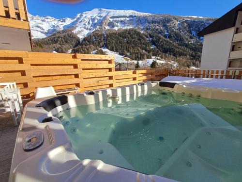 Leukerbad Apartment | Spacieux appart - 2 chambres à coucher incl Jacuzzi Privé