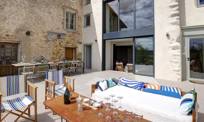Saint-Symphorien-de-Lay Cottage | Spacious townhouse with garden, terrace, and internet