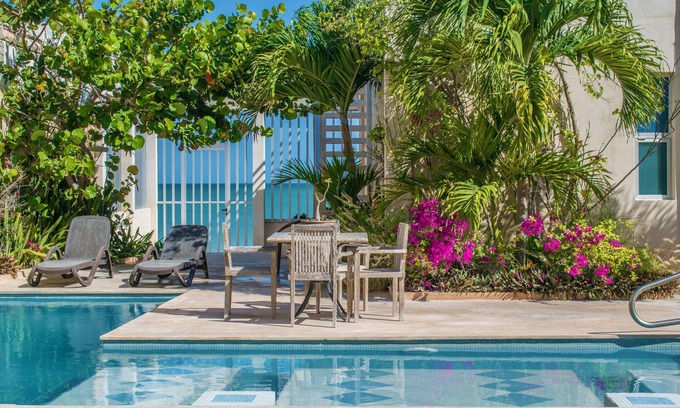 Chelem Apartment | Spacious 2-bedroom condo with pool and beach views