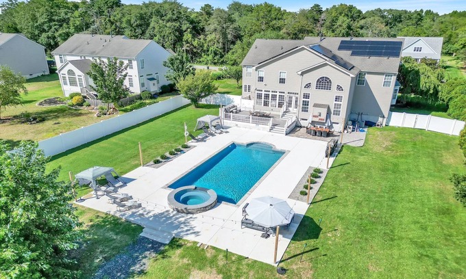 Cape May Court House House | spacious 5,500 square foot home located on one acre property, is fully fenced and Great for larger groups, comfortably accommodating 24 total guests.