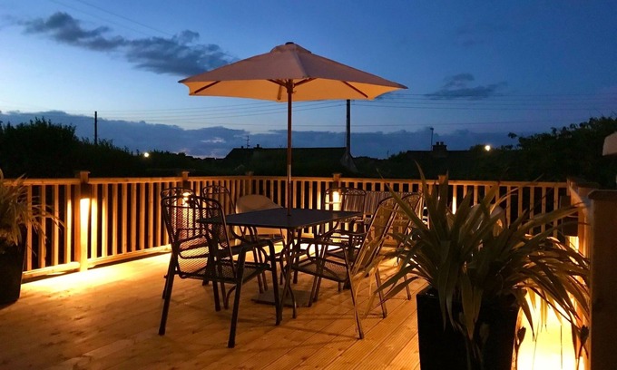 Portstewart House | Spacious bungalow. Within walking distance of beach and Promenade. Large garden