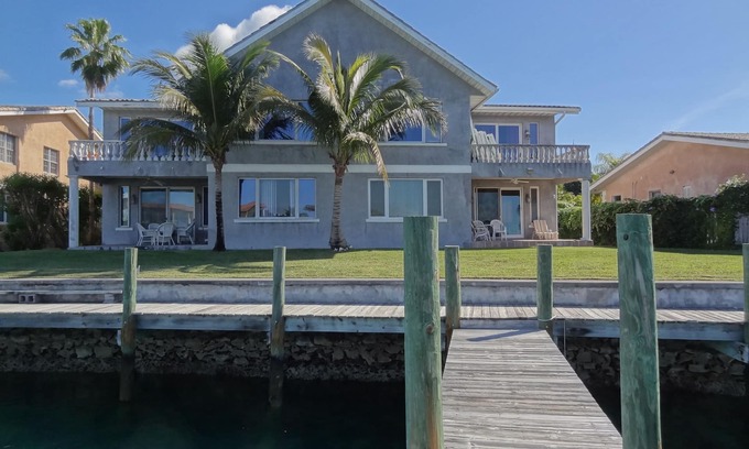 Bahamia West Condo | Spacious Gated Waterfront Villa with Private Dock