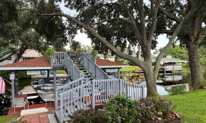 Lake Placid House | Spacious home directly on Lake Grassy canal. Boat house, hot tub & pool table