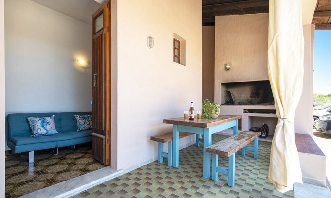 Paduledda House | Spacious House in Costa Rossa with Partial Sea View and Terrace