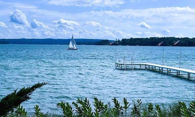 Leland House | Spacious house on Lake Leelanau with sandy beach and dock.