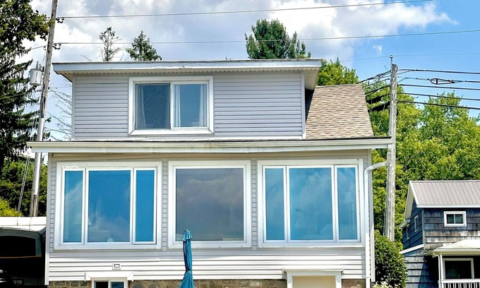 Conneaut Lakeshore House | Spacious lakefront home with private dock and a panoramic view of Conneaut Lake.