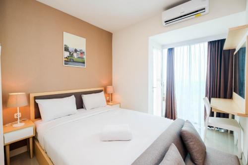 Pekayon Jaya Apartment | Spacious Studio at Grand Kamala Lagoon Apartment By Travelio