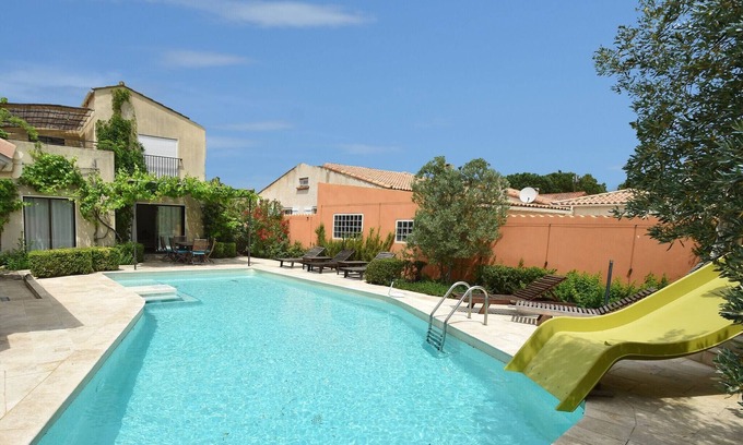 Canet Villa | Spacious villa with heated pool with super slide between the beach and lake