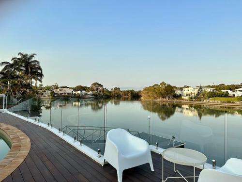 Wurtulla House | Spacious waterfront home with pontoon, pool, BBQ