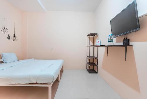 Depok Hotel | SPAZIE at Eden Guesthouse Depok