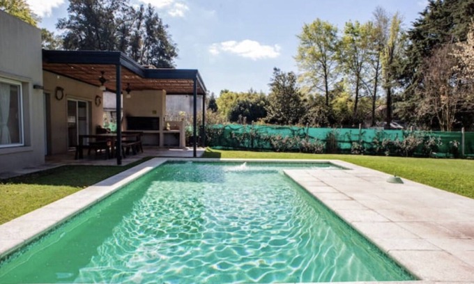 Del Viso Ski Chalet | Special home for Holidays pool and green park