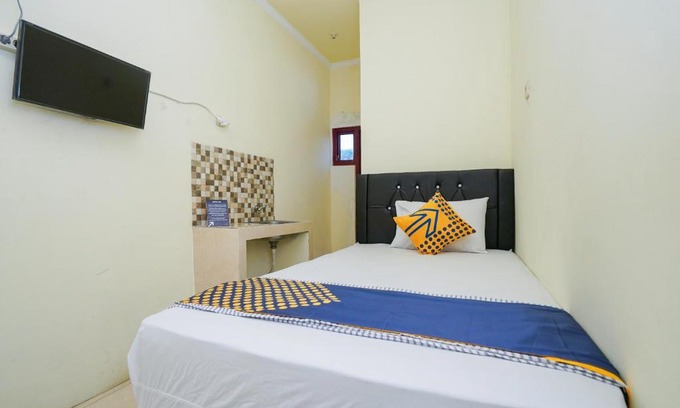 Surabaya Hotel | SPOT ON 2219 Madina Residence Syariah