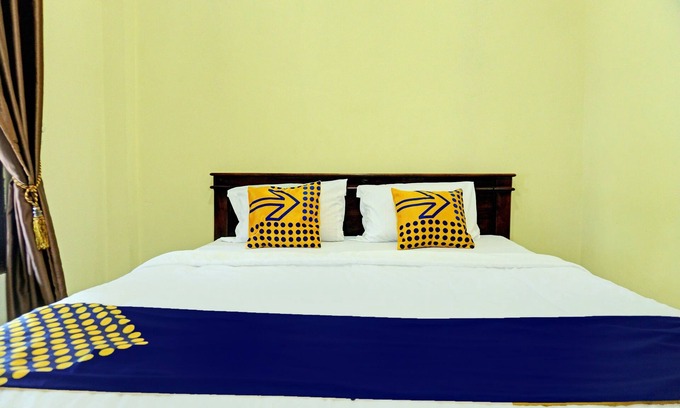 Karya Penggawa Hotel | SPOT ON 92392 Penginapan Vinccent22 Syariah