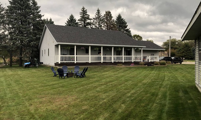 Ferrysburg House | Spring Lake waterfront home on Markers Cove with full Spring Lake access!