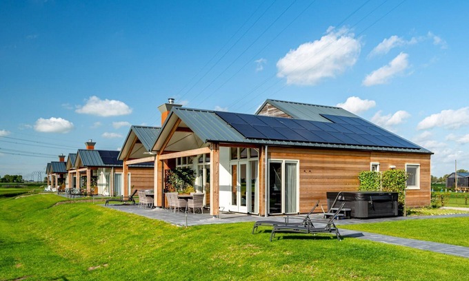 Akkrum House | Stay in our Anchor 14 Wellness family home with a sauna, an outdoor spa, and a sunshower.
